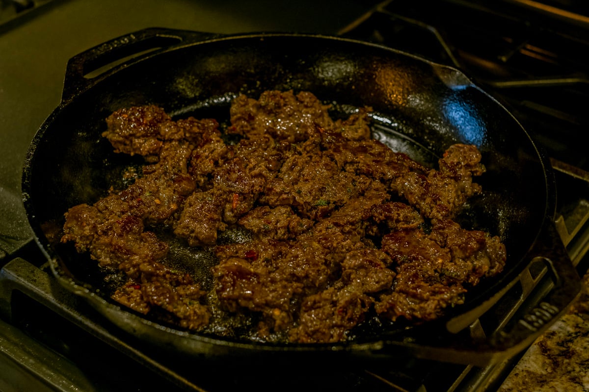 antelope breakfast sausage cooking in pan.