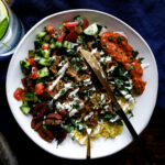 mediterranean pronhgorn with fresh toppings and saffron rice.