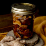marinated shiitake mushrooms in jar with ginger.