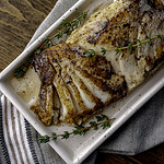 flaked sous vide halibut filet with gold fork.