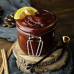 jar of cranberry sauce with oranges and cinnamon.