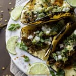 sandhill crane leg tacos with limes.