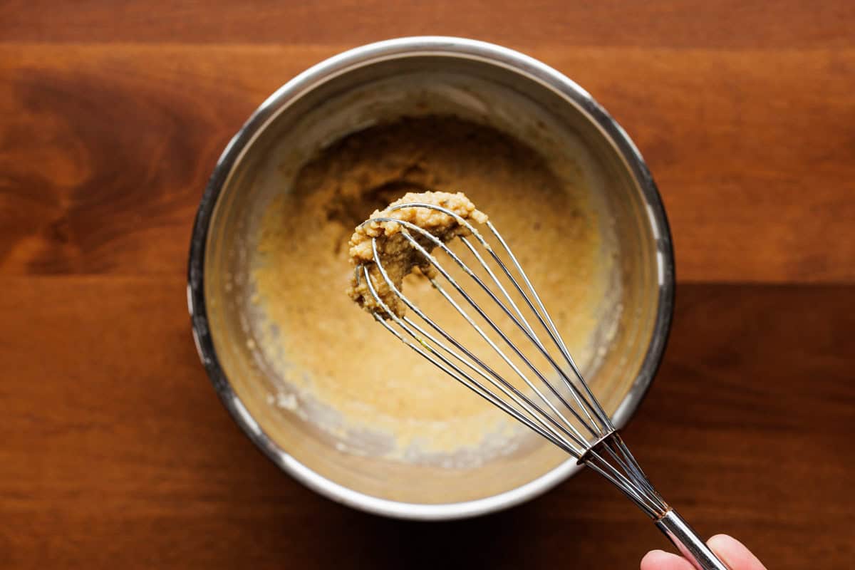 meatloaf breadcrumbs on whisk.
