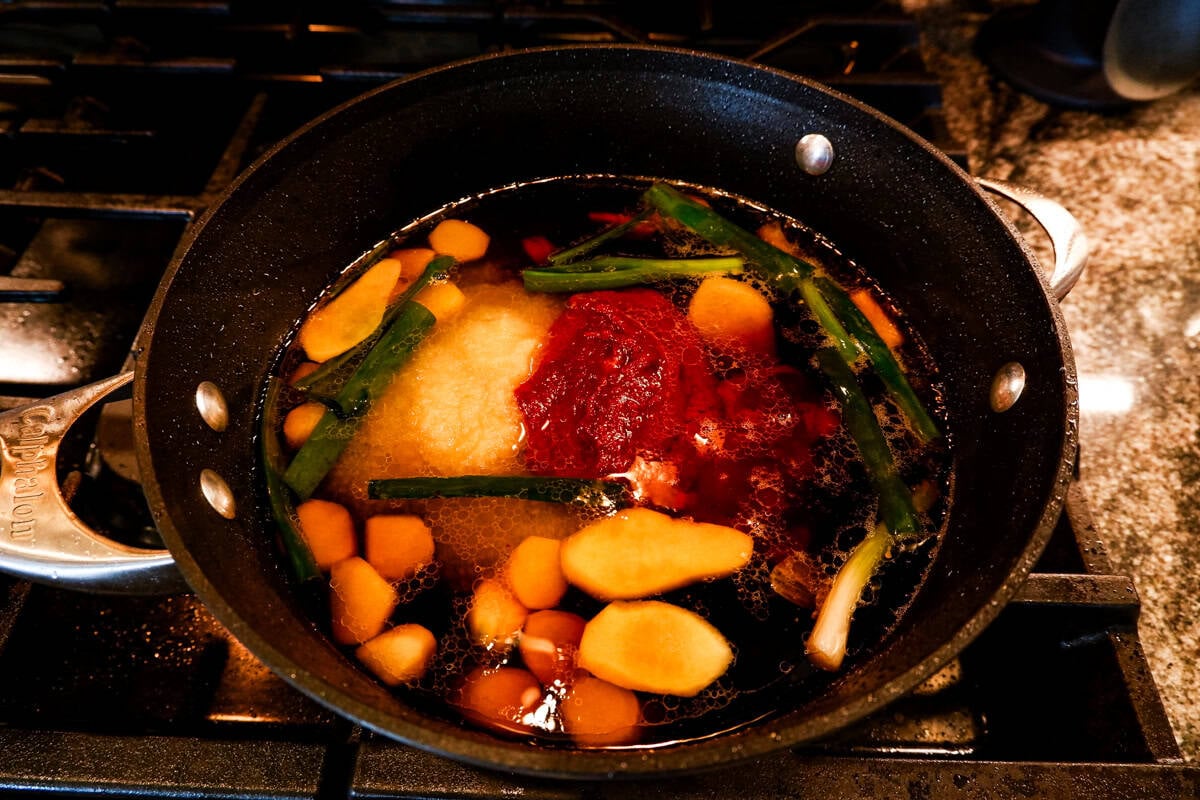 gochujang pork belly sauce in pan.