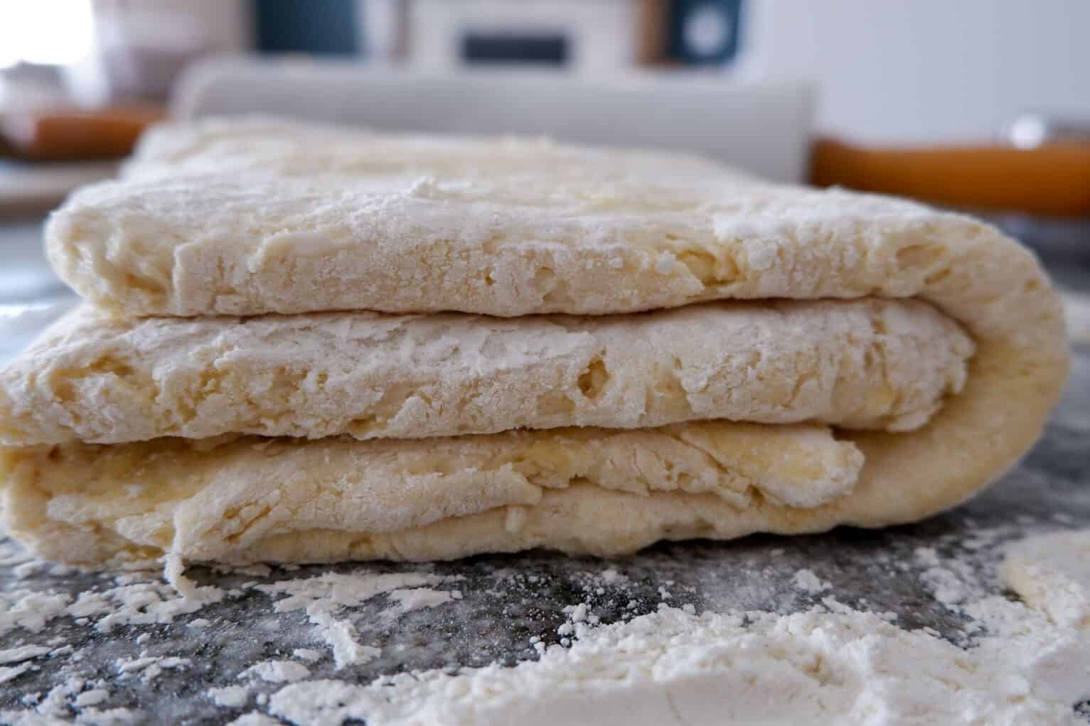 biscuit dough folded into thirds.
