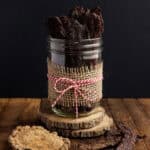 smoked elk jerky in glass jar.