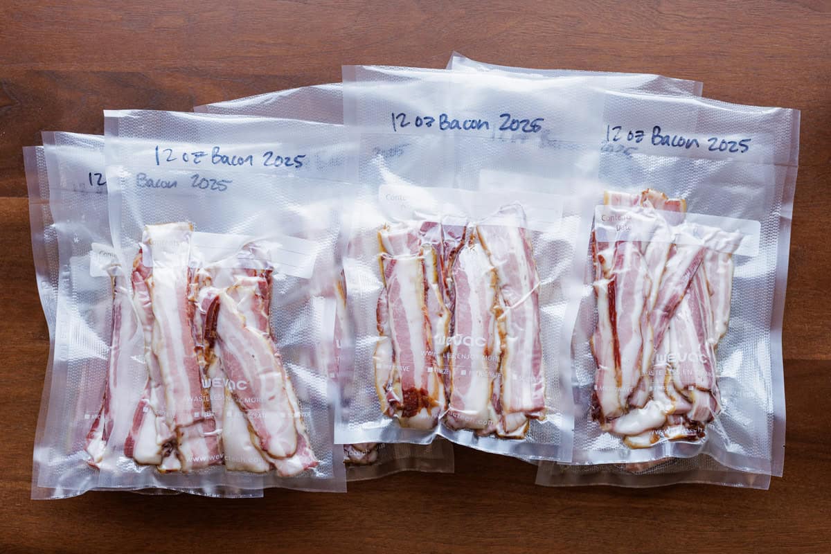 homemade smoked bacon in vacuum bags.