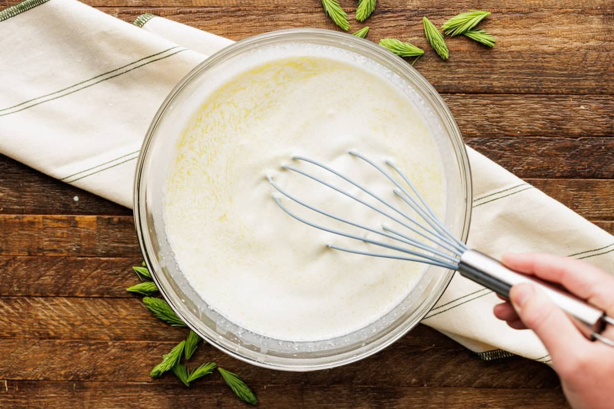 whisking ice cream base.