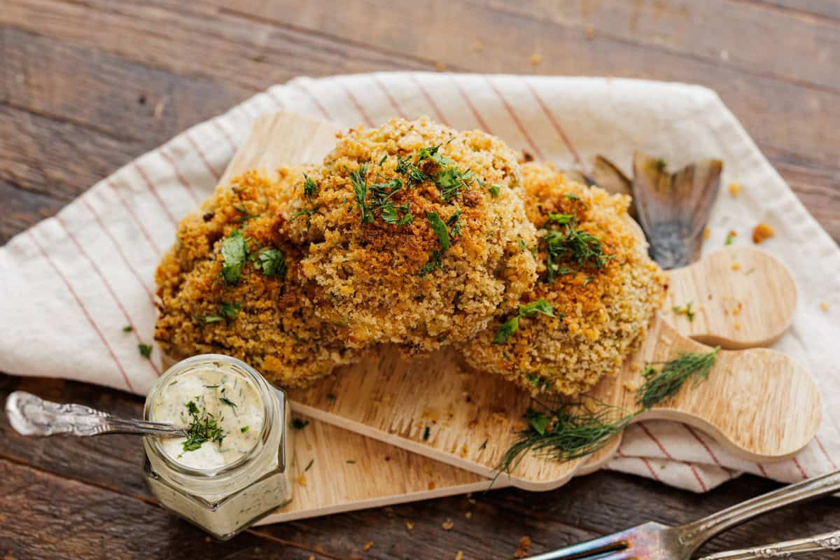 smoked trout cakes with dipping sauce.