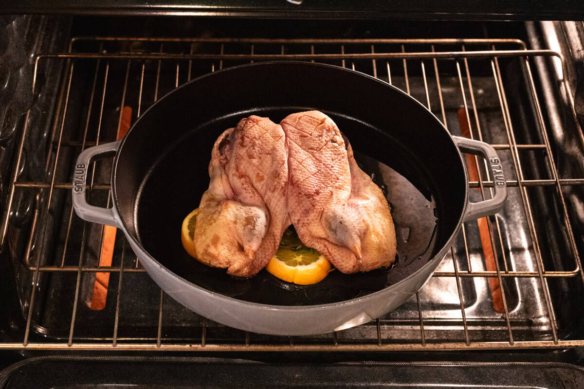 duck roasting in oven.