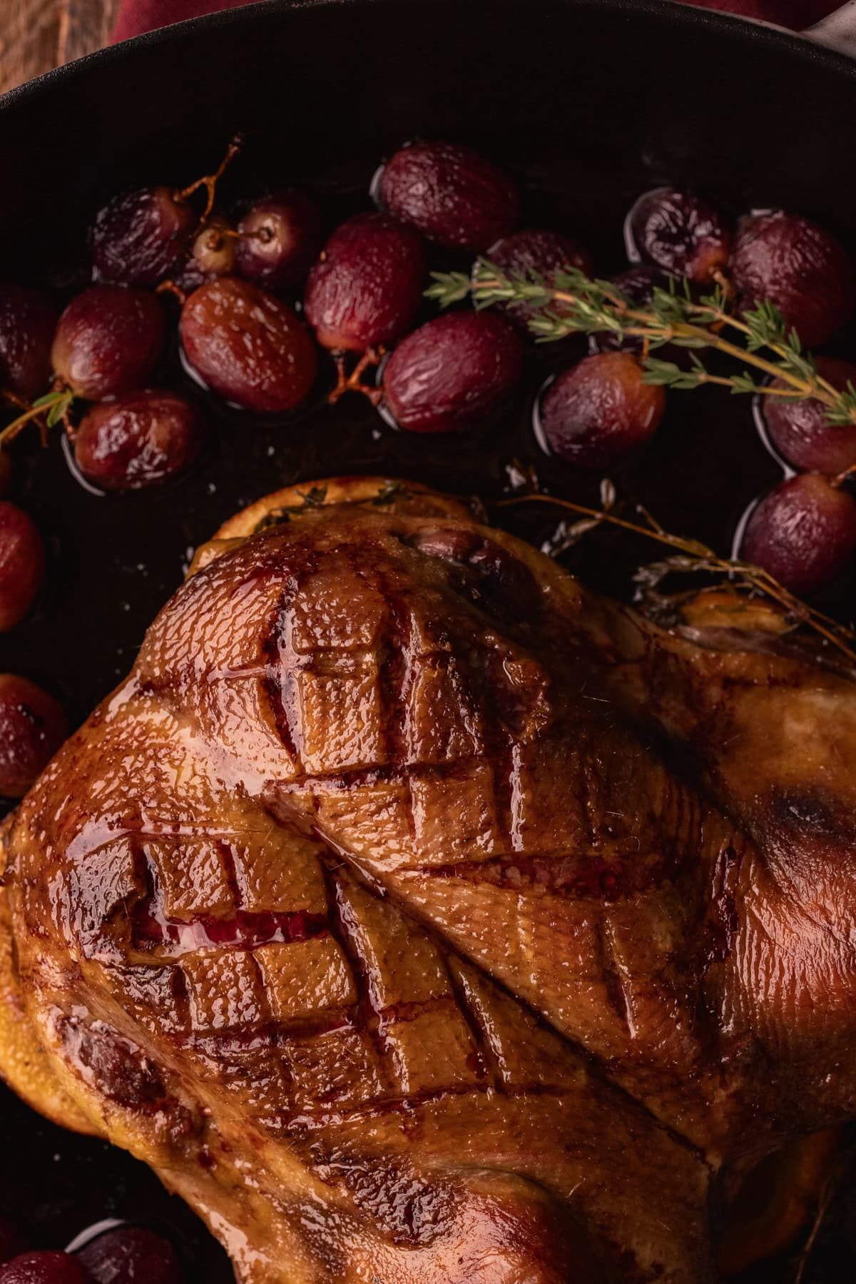 oven roasted duck with grapes.