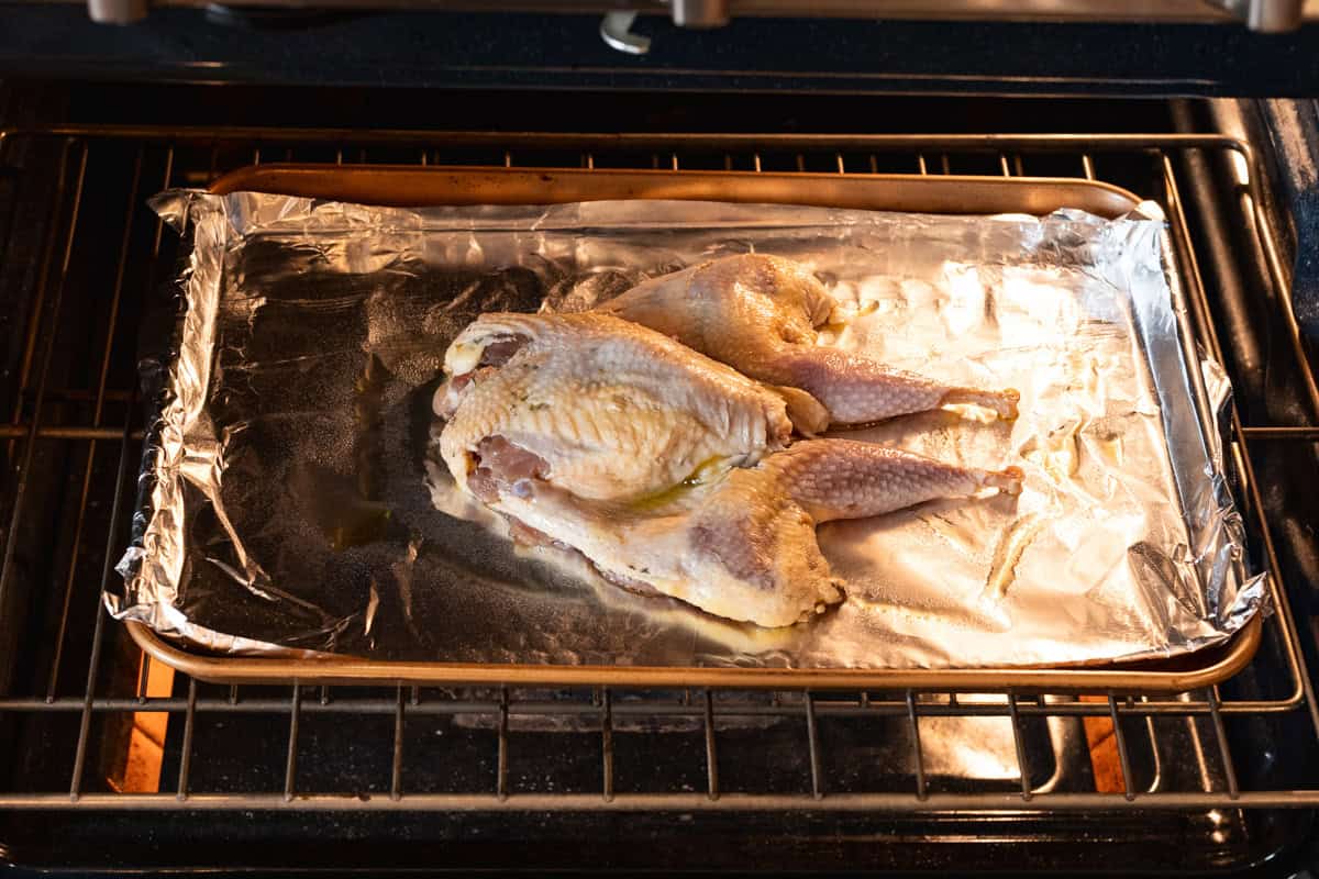 pheasant on sheet pan in oven.