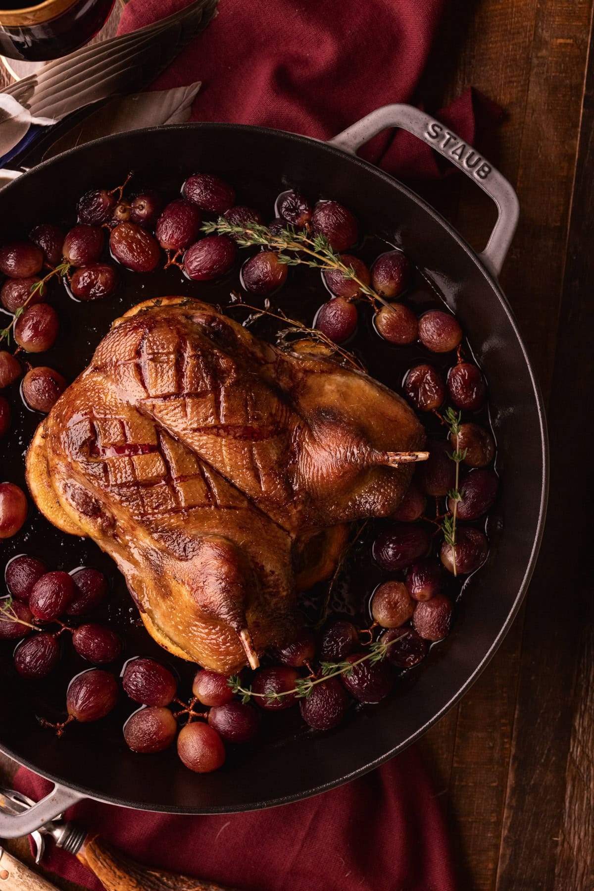 roasted duck with grapes and thyme.
