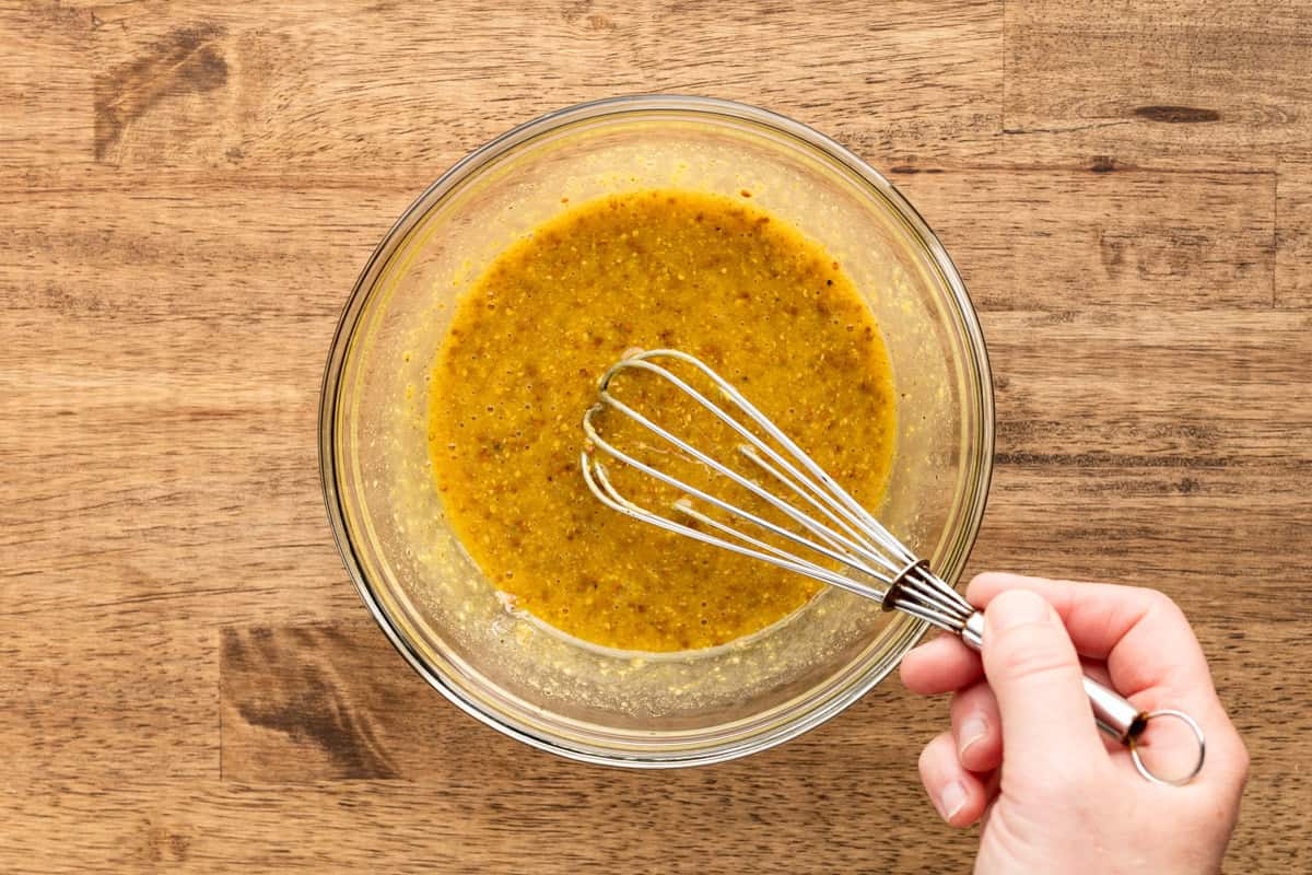 whisking honey mustard glaze.