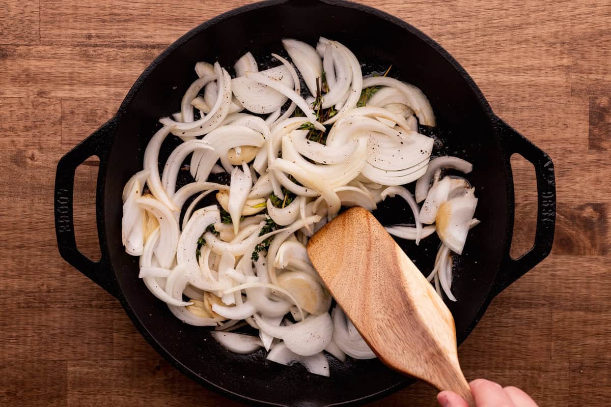 sauteeing onions and garlic in cast iron pan.