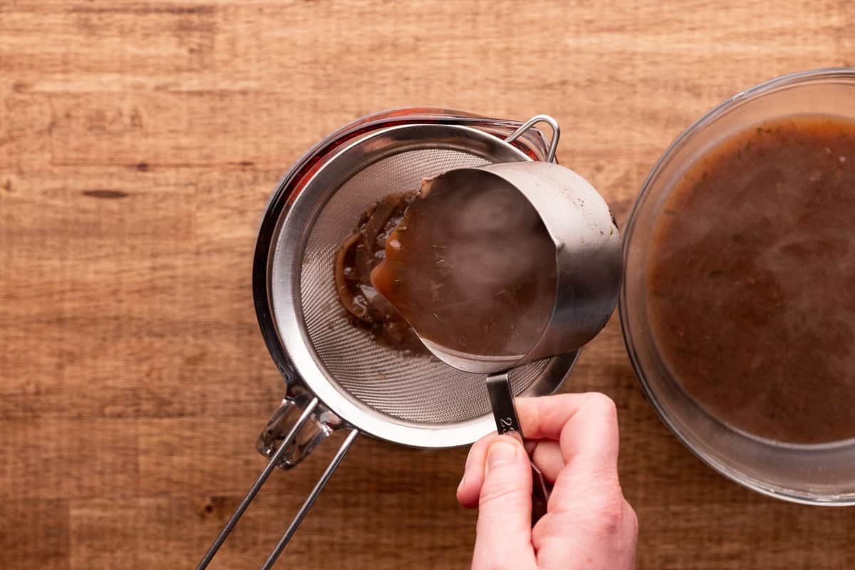 straining liquid from elk roast.