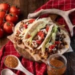 3 ground venison tacos on plate.