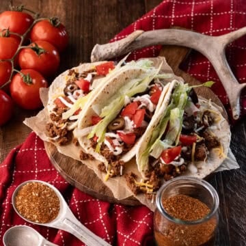 3 ground venison tacos on plate.