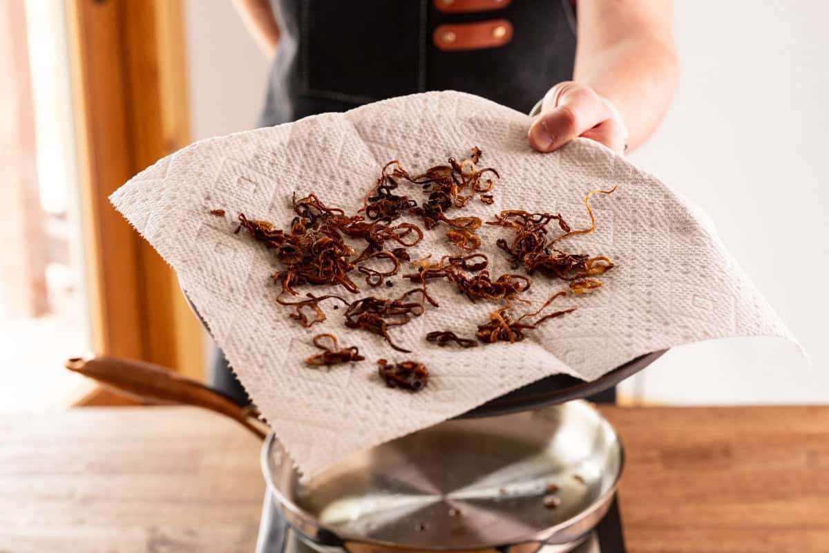 crispy shallots on plate.