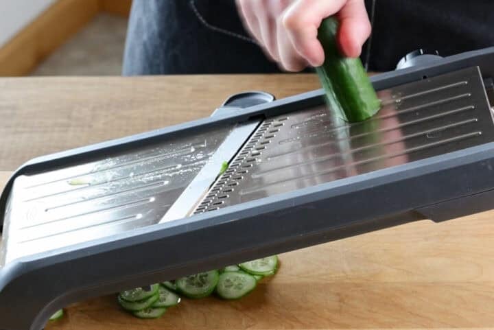slicing cucumbers with mandolin.