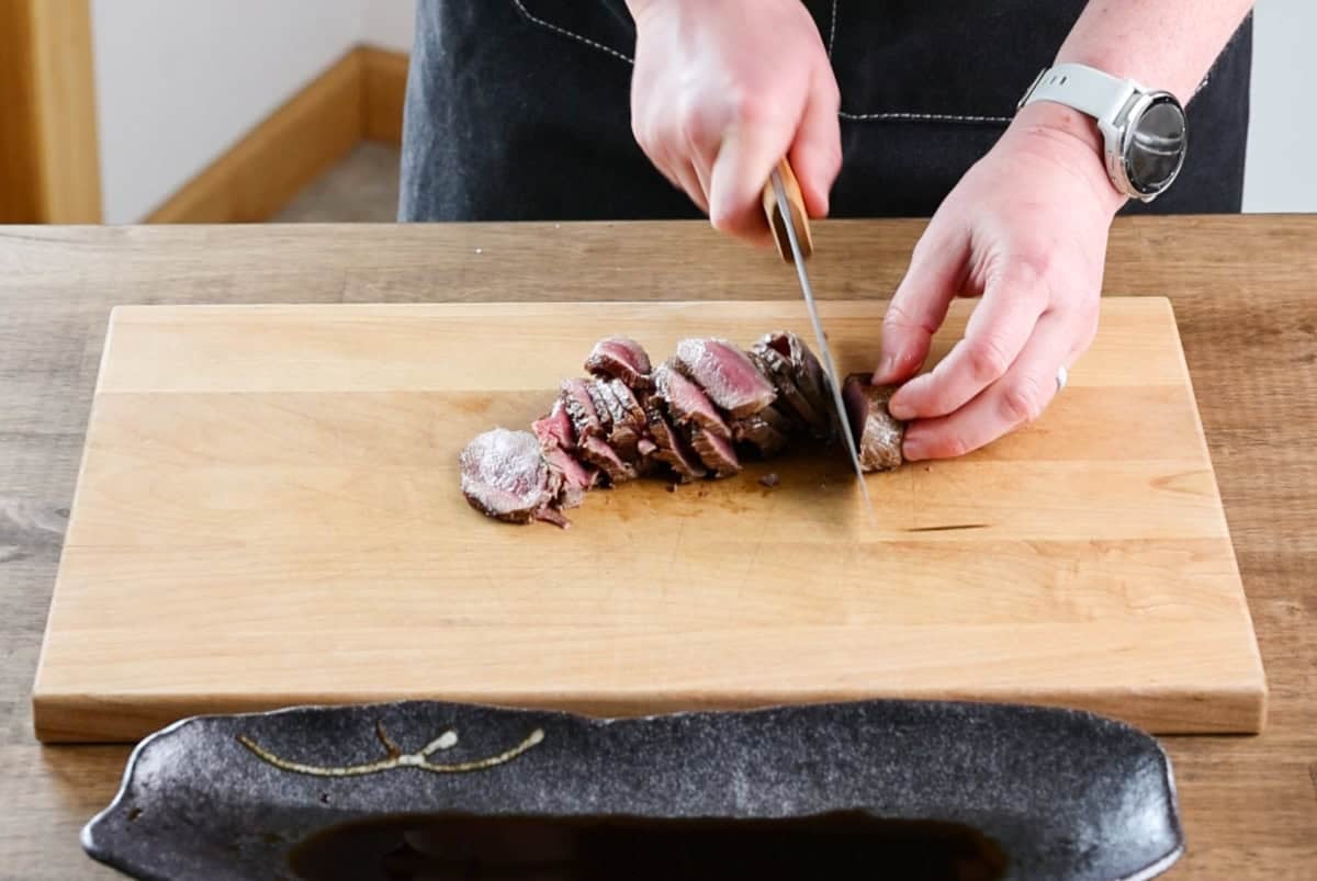 slicing venison tataki.