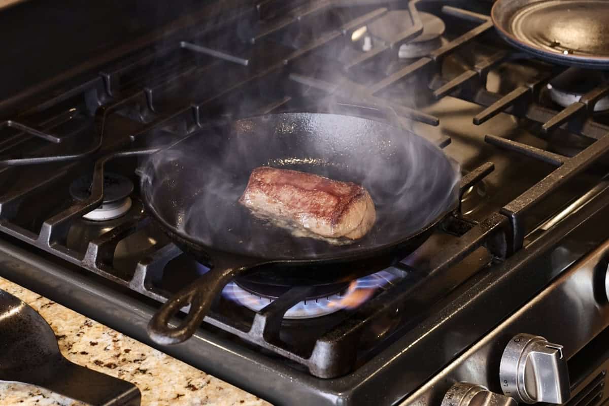 venison backstrap in pan.