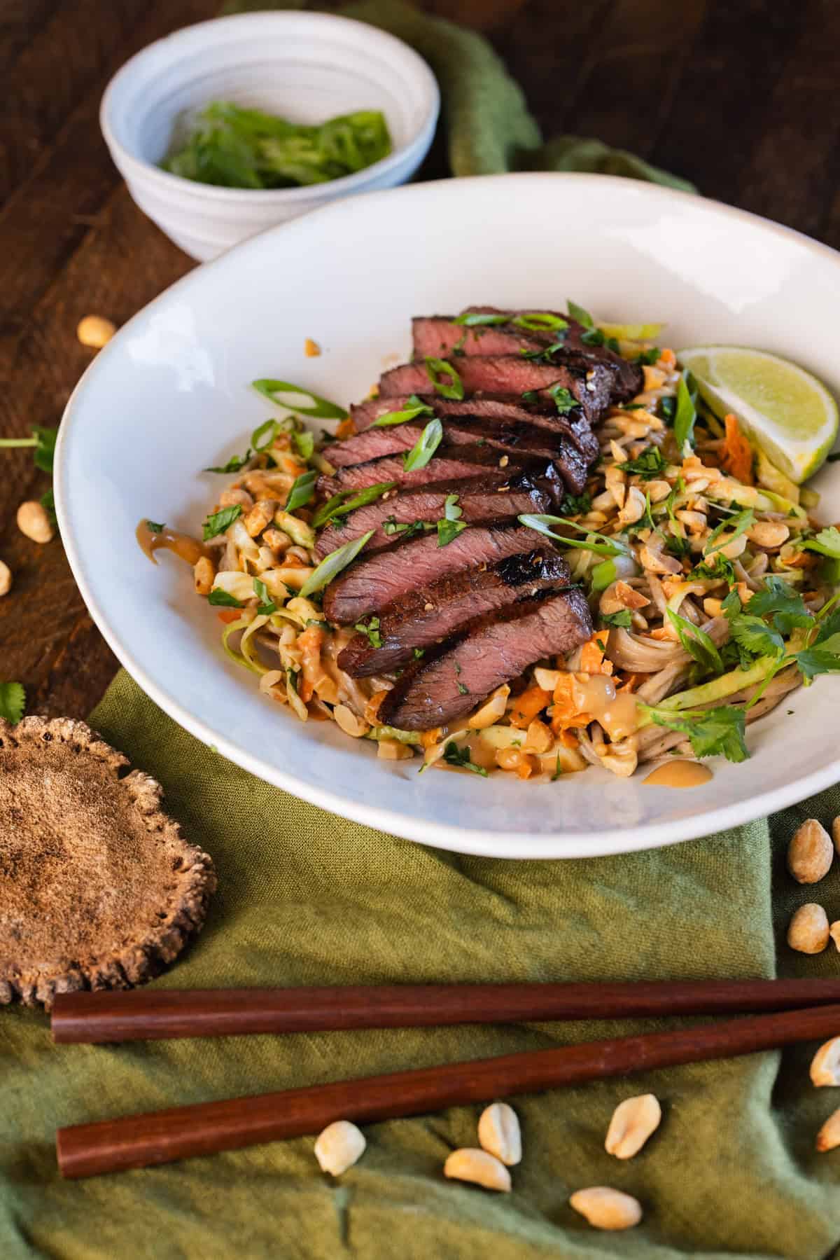 elk steak noodle bowl with peanut sauce.