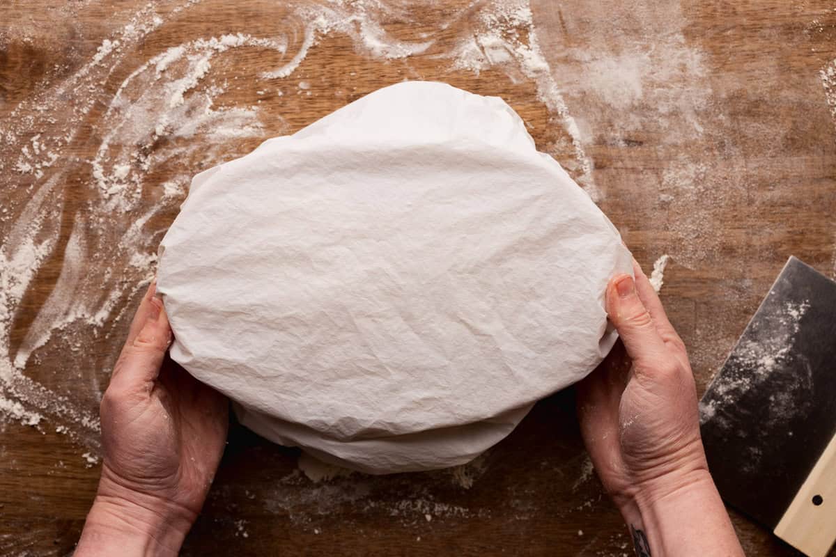 placing cover over banneton.